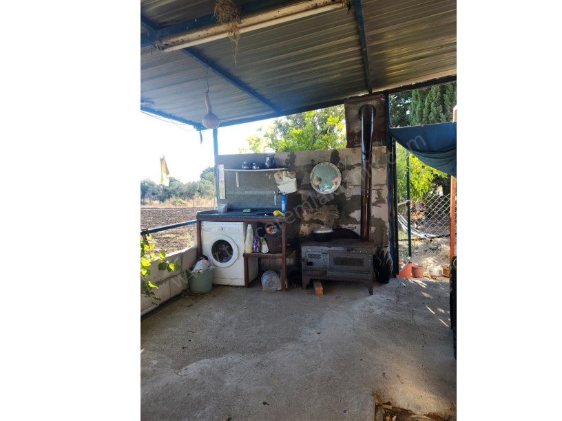 MENEMEN İĞNEDERE MAH. YOLA SIFIR 848 m2 ELEKTİRİK VE SUYU OLAN MEYVE BAHÇESİ SATILIK.