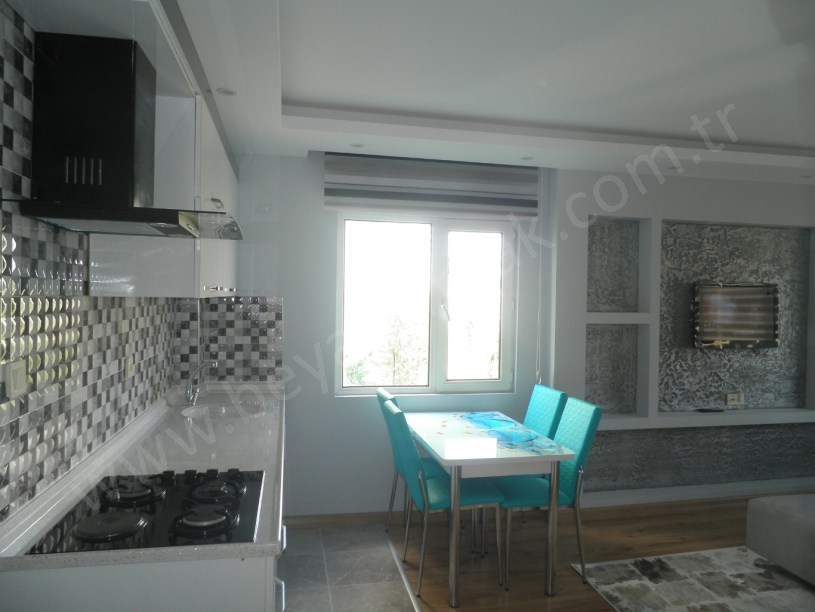 BEYAZ GAYRİMENKULDEN 2.ETAP METRO KARŞISI EŞYALI 1+1 KİRALIK