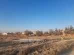 TOKİ ARKASINDA  YOLA CEPHELİ TARLA 