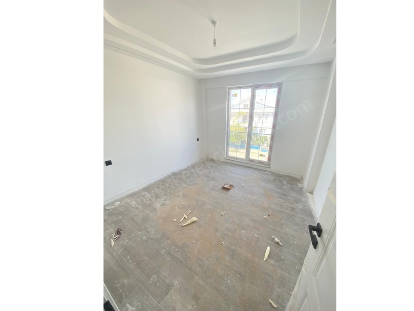 YENİ MAHALLEDE DOUBLEGARDEN SİTESİNDE ARA KATTA SATILIK 2+1