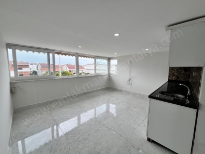 Güzeloba Sahile Ve Servis Güzergahına Yakın Katta 1+1 Kiralık Daire Muratpaşa Mah