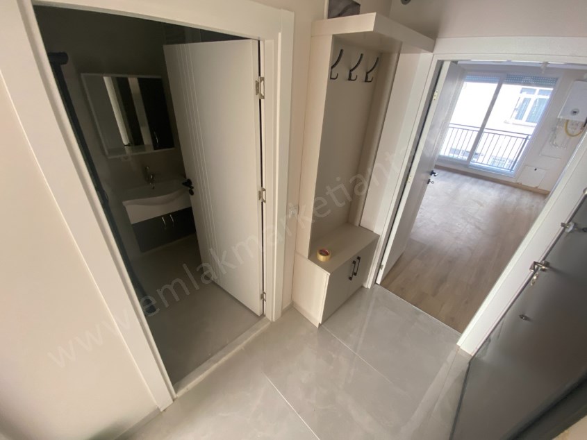 BELEDİYE ARKASI SIFIR KATTA 1+1 DAİRE 