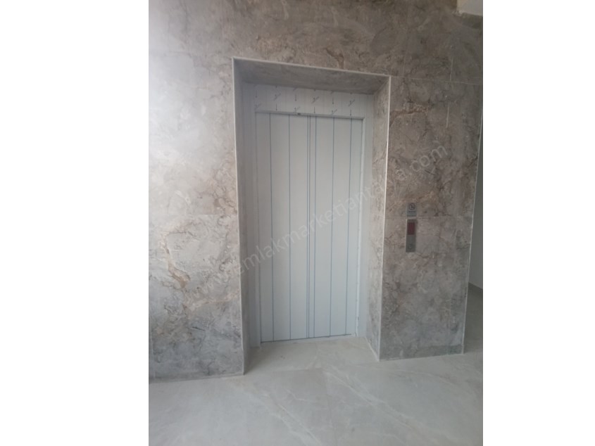 AYDOĞMUŞTA ARAKATTA , SIFIR , ASANSÖRLÜ , HUZURLU FIRSAT 1+1 SATILIK DAİRELER