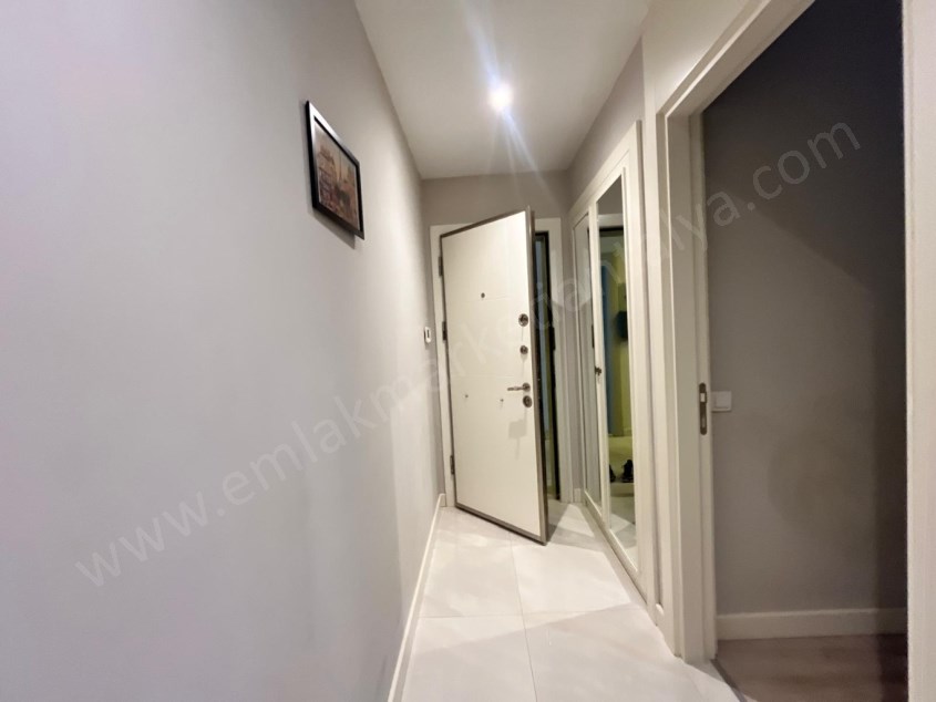 VİLLA TADINDA 1+1 EŞYALI HAVUZLU SİTE SAHİLE HAVALİMANINA YAKIN