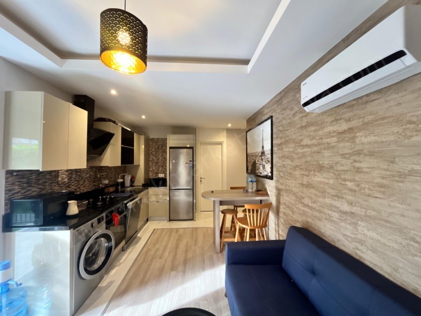 VİLLA TADINDA 1+1 EŞYALI HAVUZLU SİTE SAHİLE HAVALİMANINA YAKIN