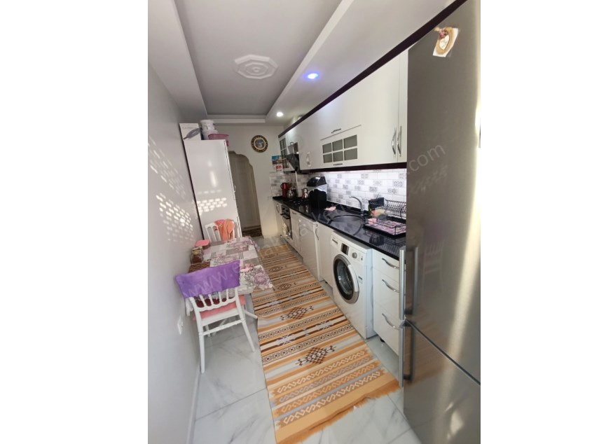 DUTLUBAHÇE MAHALLESİNDE GAZİ BULVARI YAKINI , MASRAFSIZ , TADİLATLI 2+1 SATILIK DAİRE