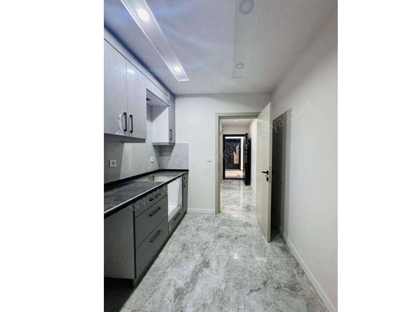 DÜDEN ŞELALESİ YAKINI SIFIR AYRI MUTFAK GENİŞ 1+1