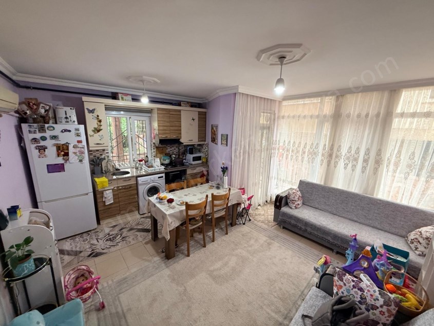 ETİLER MAHALLESİNDE DOĞALGAZ KOMBİLİ KREDİYE UYGUN BAKIMLI DAİRE