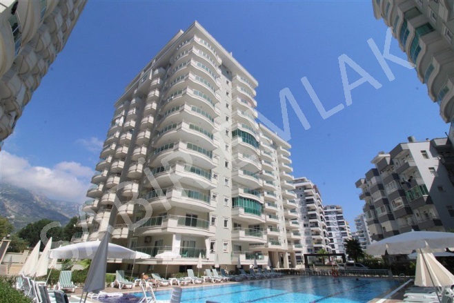Mahmutlar Mah. Alanya Satılık Daire |  2+1 Oda | 115M2 100.000€  Krediye Uygun  | 6. Kat | Klima | 1 Banyo | 2 Yatak Odası Resim-1