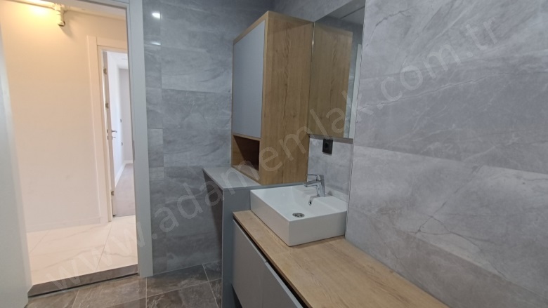 İkiçeşmelik Mah. Kuşadası Satılık Daire |  3+1 Oda | 140M2 9.500.000Tl | 1. Kat | Yerden Isıtma | 2 Banyo | 3 Yatak Odası Resim-2