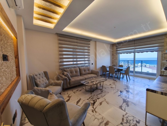 Ege Mah. Kuşadası Satılık Daire |  3+1 Oda | 130M2 11.500.000Tl Eşyalı  | 3. Kat | Klima | 2 Banyo | 3 Yatak Odası Resim-3
