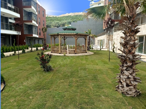 Değirmendere Mah. Kuşadası Satılık Daire |  2+1 Oda | 110M2 5.500.000Tl | Bahçe Katı | Yerden Isıtma | 2 Banyo | 2 Yatak Odası Resim-4