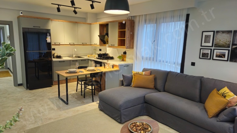 İkiçeşmelik Mah. Kuşadası Satılık Daire |  2+1 Oda | 95M2 7.200.000Tl | 2. Kat | Yerden Isıtma | 2 Banyo | 2 Yatak Odası Resim-2