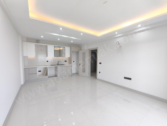 Değirmendere Mah. Kuşadası Satılık Daire |  2+1 Oda | 94M2 6.000.000Tl | Zemin Kat | Yerden Isıtma | 1 Banyo | 2 Yatak Odası Resim-2