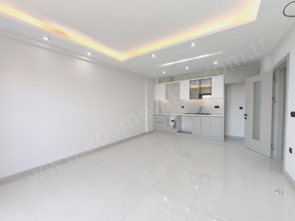 Değirmendere Mah. Kuşadası Satılık Daire |  2+1 Oda | 94M2 6.000.000Tl | Zemin Kat | Yerden Isıtma | 1 Banyo | 2 Yatak Odası Resim-3