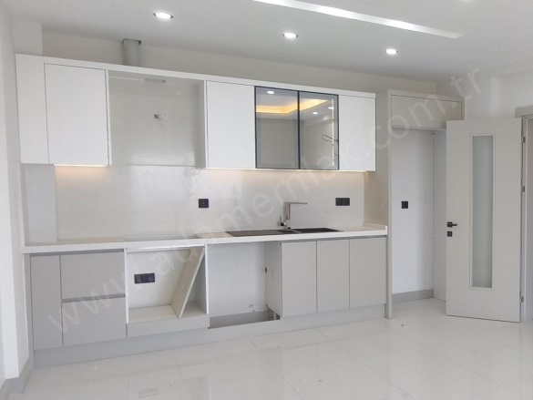 Değirmendere Mah. Kuşadası Satılık Daire |  2+1 Oda | 94M2 6.000.000Tl | Zemin Kat | Yerden Isıtma | 1 Banyo | 2 Yatak Odası Resim-4