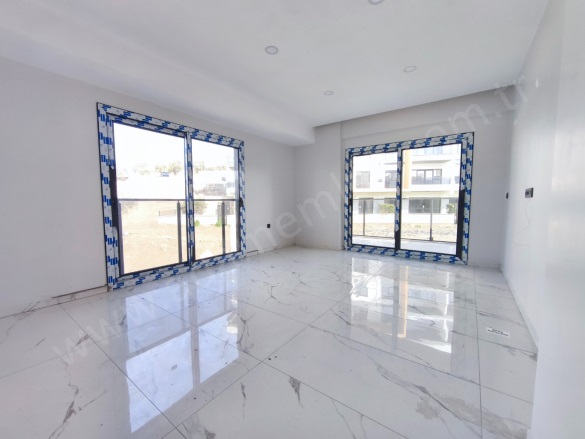 İkiçeşmelik Mah. Kuşadası Satılık Daire |  2+1 Oda | 70M2 5.750.000Tl | 1. Kat | Yerden Isıtma | 1 Banyo | 2 Yatak Odası Resim-1