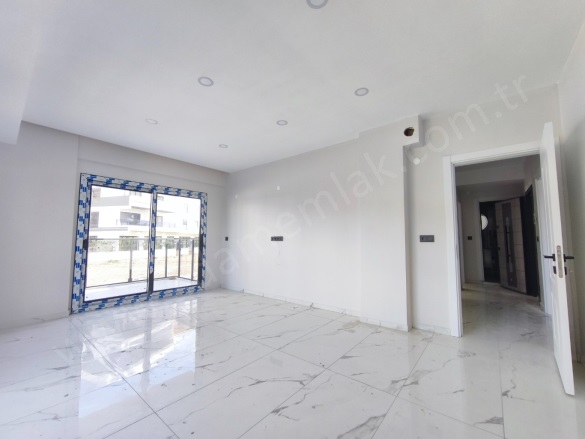 İkiçeşmelik Mah. Kuşadası Satılık Daire |  2+1 Oda | 70M2 5.750.000Tl | 1. Kat | Yerden Isıtma | 1 Banyo | 2 Yatak Odası Resim-2