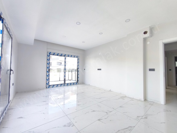 İkiçeşmelik Mah. Kuşadası Satılık Daire |  2+1 Oda | 70M2 5.750.000Tl | 1. Kat | Yerden Isıtma | 1 Banyo | 2 Yatak Odası Resim-3