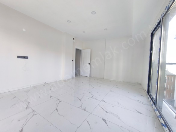 İkiçeşmelik Mah. Kuşadası Satılık Daire |  2+1 Oda | 70M2 5.750.000Tl | 1. Kat | Yerden Isıtma | 1 Banyo | 2 Yatak Odası Resim-4