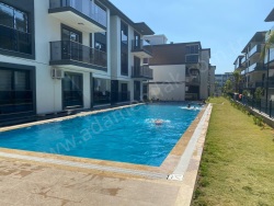 Kuşadası Davutlar Mah. Satılık Daire 2+1 85 M2 | 1. Kat | Kat Kaloriferi | 1 Banyo | 2 Yatak Odası