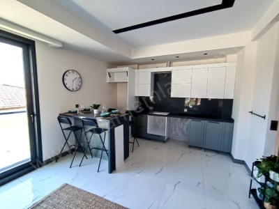 Kuşadası Merkezde Satılık Daire Yeni 2+1 Ler Hacıfeyzullah Mah