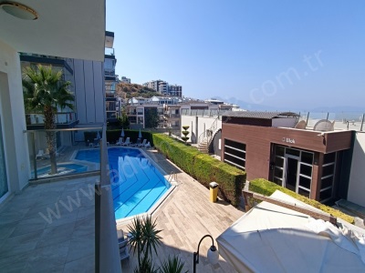 Kuşadası Merkezde Satılık Daire Deniz Manzaralı Bakımlı 2+1 Değirmendere Mah