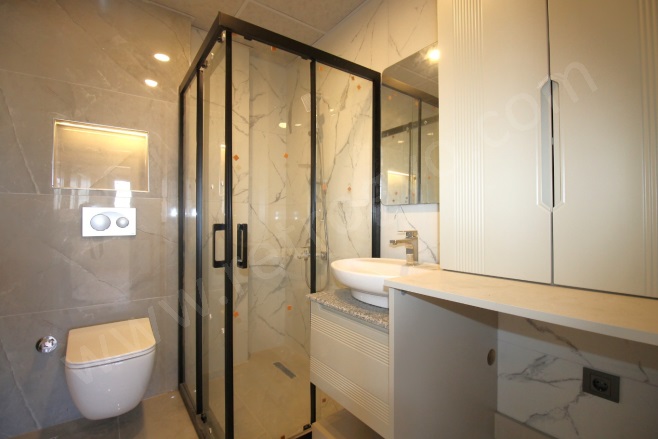 Kuyuluk Mah. Mezitli Satılık Daire |  2+1 Oda | 100M2 4.400.000Tl  Krediye Uygun  | 3. Kat | Doğalgaz(Kombi) | 2 Banyo | 2 Yatak Odası Resim-4