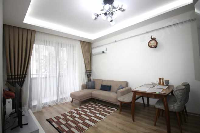 Retrodan Tecede Lüks Konsept Site içerisinde Eşyalı 1+1 Satılık Daire Mezitli Tece Mah