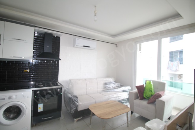 Çiftlikköy Mah. Yenişehir Kiralık Daire |  1+1 Oda | 65M2 Aylık 15.000Tl  Krediye Uygun  Eşyalı  | 1. Kat | Klima | 1 Banyo | 1 Yatak Odası Resim-1