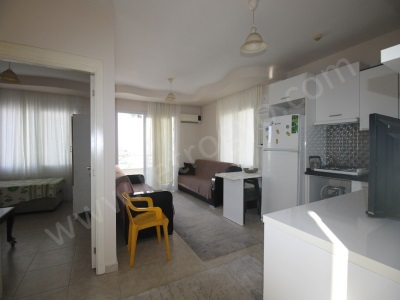 Retrodan Çiftlikköyde Geniş Eşyalı Kiralık Daire 1+1 Yenişehir Çiftlikköy Mah