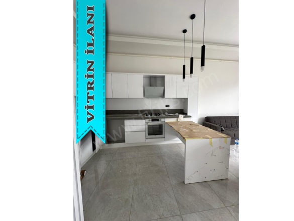 Kadınlar Denizi Mah. Kuşadası Kiralık Daire |  2+1 Oda | 100M2 Aylık 50.000Tl | Bahçe Katı | Yerden Isıtma | 2 Banyo | 2 Yatak Odası Resim-3