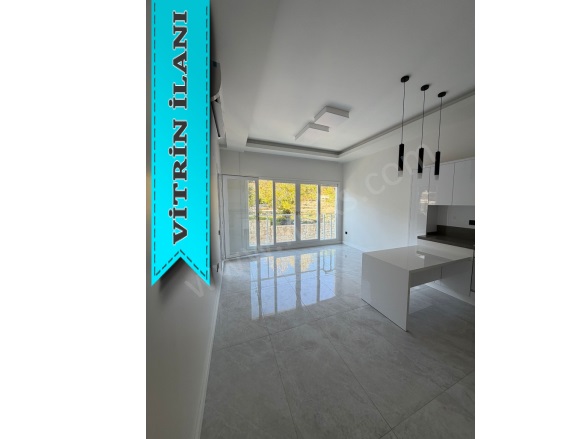 Kadınlar Denizi Mah. Kuşadası Satılık Daire |  1+1 Oda | 70M2 6.990.000Tl | 2. Kat | Yerden Isıtma | 1 Banyo | 1 Yatak Odası Resim-1