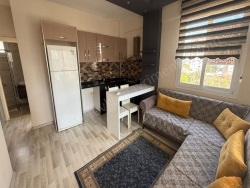 Yenişehir Çiftlikköy Mah. Kiralık Daire 1+1 65 M2 | 5. Kat | Klima | 1 Banyo