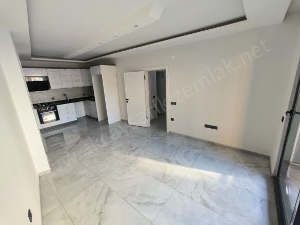 Tuzcumurat Mah. Edremit Satılık Daire |  2+1 Oda | 85M2 3.500.000Tl  Krediye Uygun  | 2. Kat | Doğalgaz(Kombi) | 1 Banyo | 1 Yatak Odası Resim-2