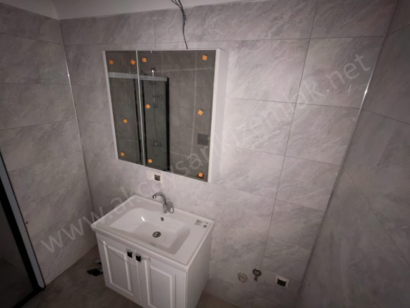 Tuzcumurat Mah. Edremit Satılık Daire |  2+1 Oda | 115M2 4.250.000Tl | 1. Kat | Doğalgaz(Kombi) | 2 Banyo | 1 Yatak Odası Resim-4