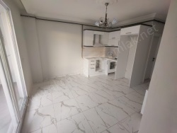 Edremit Tuzcumurat Mah. Satılık Daire 1+1 70 M2 | 1. Kat | Doğalgaz(Kombi) | 1 Banyo | 1 Yatak Odası