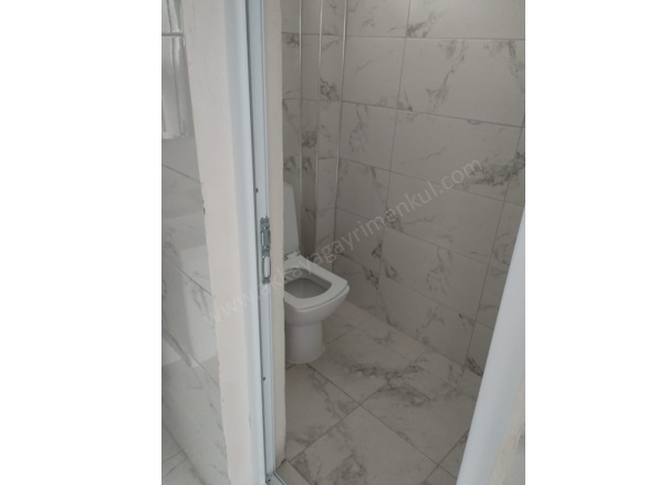 Camikebir Mah. Ezine Kiralık Müstakil Ev |  1+1 Oda | 75M2 Aylık 18.000Tl | 2. Kat | Doğalgaz(Kombi) | 1 Banyo | 1 Yatak Odası Resim-4