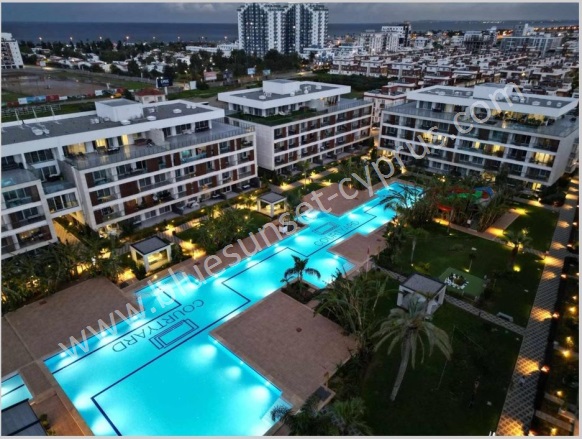 Long Beach İskele Satılık Daire |  1 Oda | 50M2 90.000£ Eşyalı  | 1. Kat | Klima | 1 Banyo | 1 Yatak Odası Resim-1