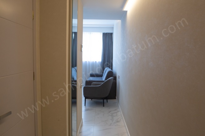 Merkez Batum Kiralık Daire |  1+1 Oda | 55M2 Aylık 850$ Eşyalı  | 13. Kat | Klima | 1 Banyo Resim-2