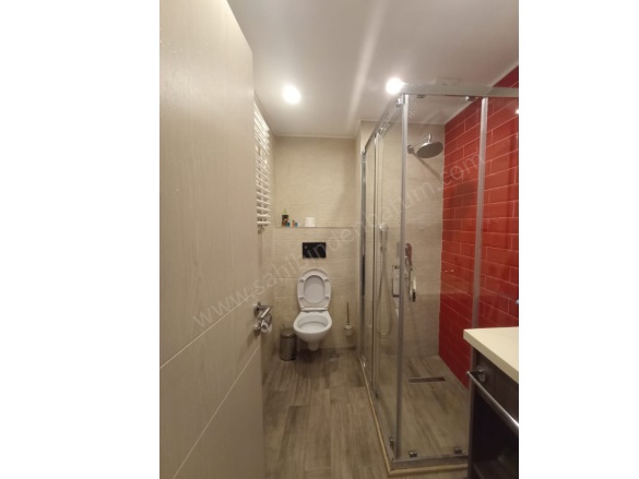 Merkez Batum Satılık Daire |  Stüdyo Oda | 55M2 72.000$ Eşyalı  | 2. Kat | Klima Resim-3