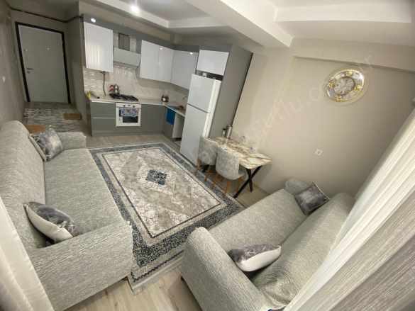 Turgutlu Satılık Daire Ergenekon Mah 1+1 Oda 60M2 Otopark Üstü Ön Cephe Eşyalı Sıfır