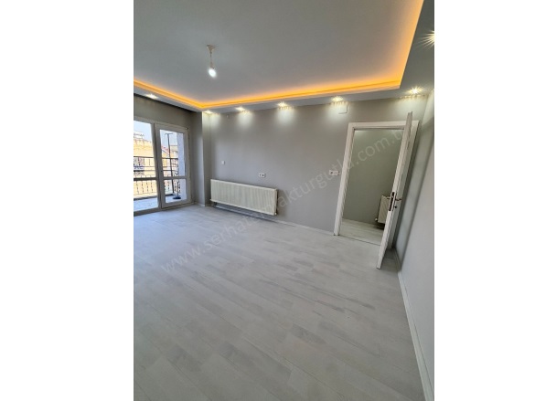 Şehitler Mah. Turgutlu Satılık Daire |  3+1 Oda | 125M2 2.850.000Tl  Krediye Uygun  | 4. Kat | Doğalgaz(Kombi) | 1 Banyo | 1 Yatak Odası Resim-2