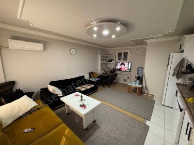 Turgutlu Satılık Daire İstiklal Mah 160M2 3+1 Oda 40M2 Havuzlu Şömineli Bahçe Doğalgazlı Zemin Kat