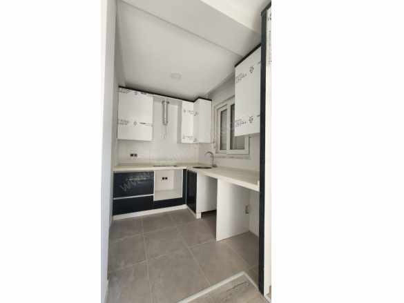 Döşemealtı Atatürk Caddesi Yakınında Katta Satılık Daire iskanlı Fırsat ! 2+1 Orta Mah