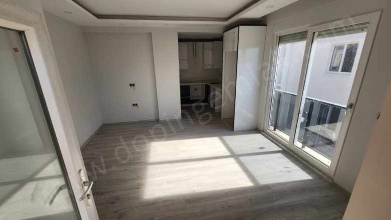 Döşemealtı Atatürk Caddesi Yakınında Katta Satılık Daire iskanlı Fırsat ! 2+1 Orta Mah