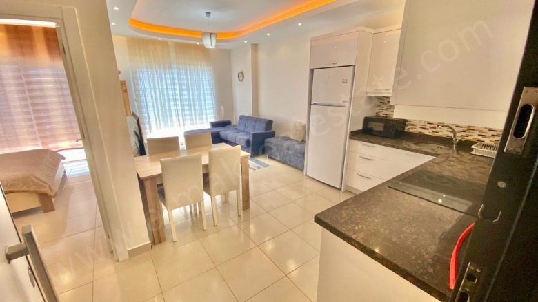 Mahmutlar Mah. Alanya Satılık Daire |  1+1 Oda | 65M2 83.000€  Krediye Uygun  Eşyalı  | 5. Kat | Klima | 1 Banyo | 1 Yatak Odası Resim-5