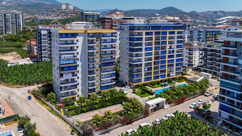 Mahmutlar Mah. Alanya Acil Satılık Daire |  2+1 Oda | 105M2 125.000€ Eşyalı  | 7. Kat | Klima | 2 Banyo | 2 Yatak Odası Resim-2