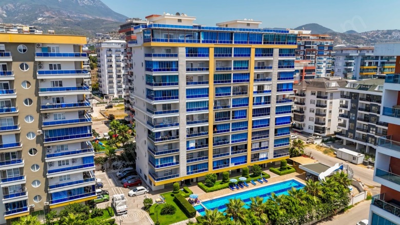 Mahmutlar Mah. Alanya Acil Satılık Daire |  2+1 Oda | 105M2 125.000€ Eşyalı  | 7. Kat | Klima | 2 Banyo | 2 Yatak Odası Resim-3