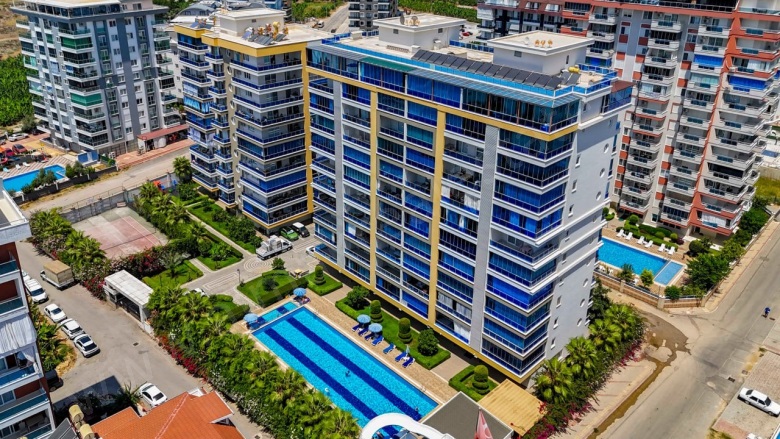Mahmutlar Mah. Alanya Acil Satılık Daire |  2+1 Oda | 105M2 125.000€ Eşyalı  | 7. Kat | Klima | 2 Banyo | 2 Yatak Odası Resim-4